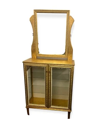 Gabinete de curiosidades de hoja dorada hecho por Mongelli Foto 1 de 4