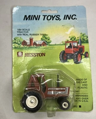 1/64 Mini Toys Hesston 130-90 Tractor With Duals Stock Number 7211 - Image 1 of 4