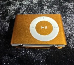 Apple iPod Shuffle 2nd Generation (Orange) Tested!! Comes W/ Accessories!! ๐ถ - Afbeelding 1 van 6