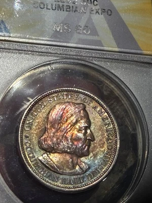 1892 50c Columbian Expo ANACS MS60 Rainbow Toned #7859641 - Image 1 of 4