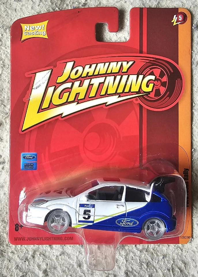 2010 Johnny Lightning “Forever 64” Blue/White Ford Focus Rally White Lightning  - Image 1 of 1