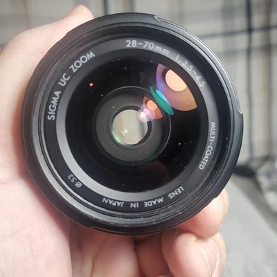 Объектив Sigma UC Zoom 28-70 мм f/3.5-4.5 серии UC винтажный с ручной фокусировкой - Изображение 1 из 4