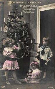 Los mejores deseos para Navidad niños recortando el árbol muñeca juguetes RPPC - Imagen 1 de 2