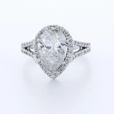 Anillo de compromiso con halo de piedra lateral de oro de 14 quilates pera de 3,29 quilates diamante cultivado en laboratorio E SI1 Foto 1 de 4