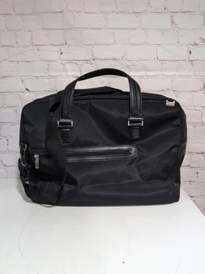 Bolso de Mano TUMI de Nylon Balístico 48920 Negro Cuero Borde Negocios Laptop Equipaje de Mano  Foto 1 de 4
