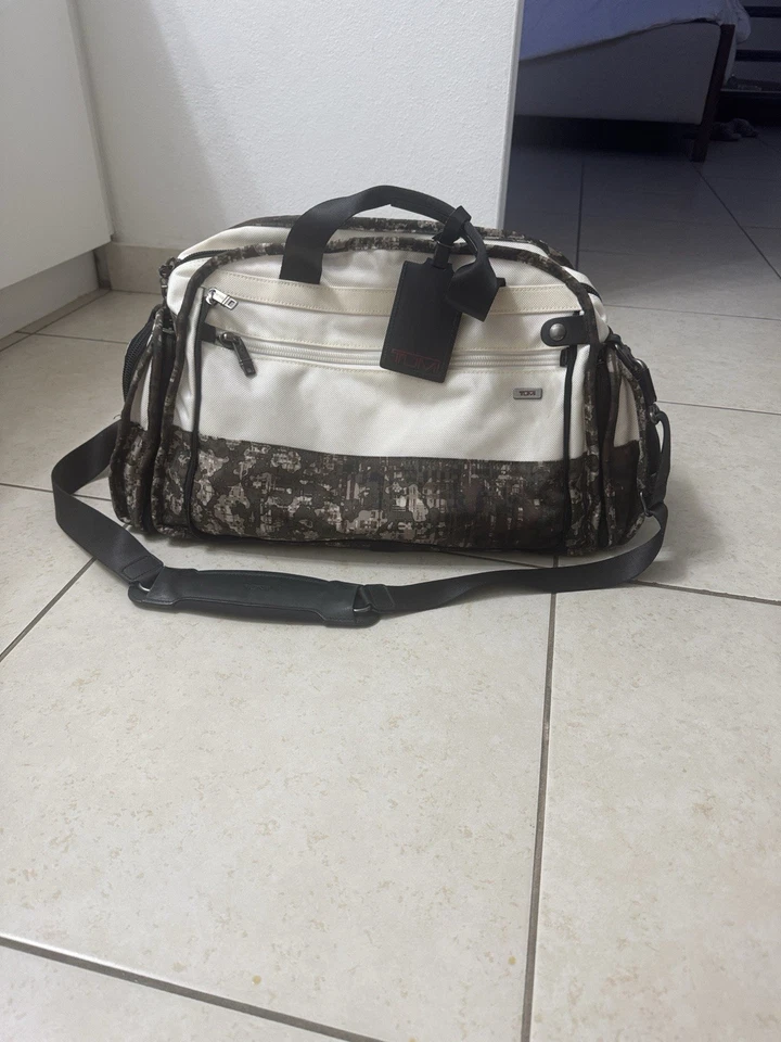Bolso de Lona Tumi Crema y Camuflaje Foto 1 de 4