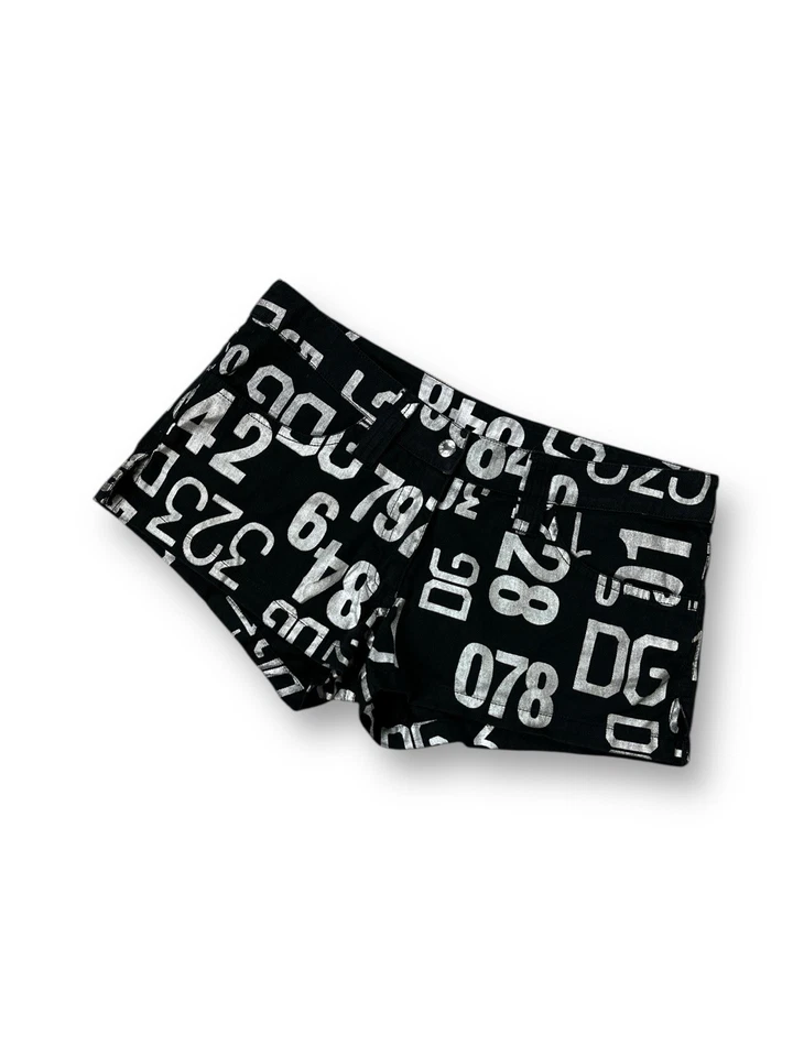 Mini Pantalones Cortos Dolce & Gabbana Beachwear Negros Con Logotipos Plateados DG Para Mujer Talla S” Foto 1 de 4