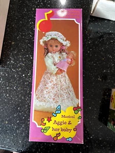Musical Aggie and her baby - Picture 1 of 2