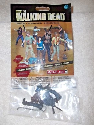 Walking Dead McFarlane Juego de Construcción Bolso Ciego Serie Uno Michonne Pet Walker NUEVO Foto 1 de 3