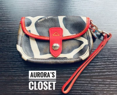 Muñequera de cuero cebra Dooney & Bourke DB de colección Foto 1 de 4