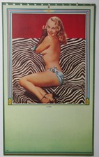 VINTAGE PINUP GIRL CALENDAR TOP LITHO "ALLURING" BLONDE POSING ON ZEBRA BLANKET