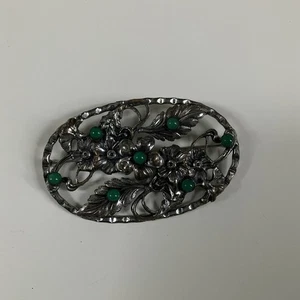 Vintage Brosche in ovaler Form Zinn und grünem Blumenmuster - Bild 1 von 3