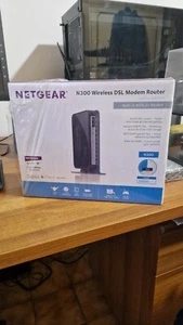 NETGEAR DGN2200 Modem Router Wi-Fi ADSL 802.11n Fino a 300 Mbps - Foto 1 di 7