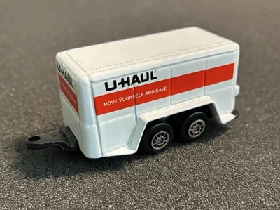 Vintage Maisto 1:64 U-Haul 4 Wheel Moving Trailer 3” GREAT CONDITION - Image 1 of 4