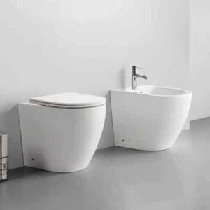 SANITARI A TERRA TAURUS FILO MURO SCARICO VORTEX WC BIDET Rallentata Coprivaso - Foto 1 di 12