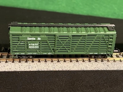 Set Of 4 Trix Austria N Scale Rolling Stock Cars & Caboose Pre Owned - Image 1 of 4