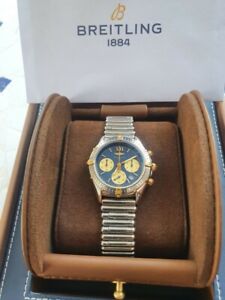 montre Breitling homme chronomètre - or et acier - bracelet rouleau (très rare) 
