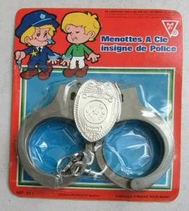 Ancien jouet de bazar neuf : Paire de menottes à clé insigne de Police MF Marki - Imagen 1 de 4