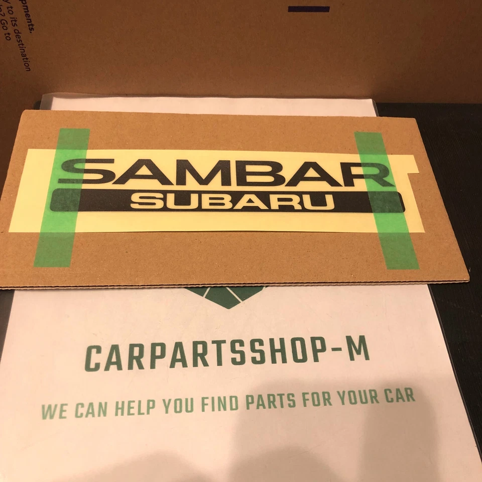Subaru Sambar Black Rear Emblem Seal Name Decal Sticker 75471B5070 Genuine JDM - Image 1 of 1