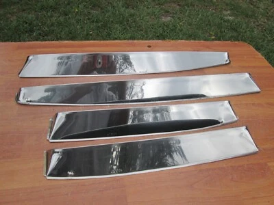 1951 OLDSMOBILE 98 DELUXE 4DR SEDAN VENTSHADES G89 NOS - Image 1 of 4