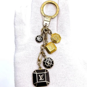 Louis Vuitton M66001 Cabochon Porte Cles Amarante Gold Schlüsselanhänger Taschenanhänger Japan - Bild 1 von 5