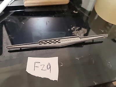 Pontiac Bonneville 1965 emblema panel puerta interior 4488049 GM BIN FZ9 de colección Foto 1 de 4