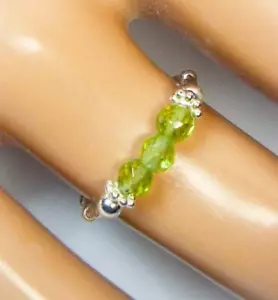 ANELLO ELASTICO CYNTHIA LYNN PERIDOT PASSION ARGENTO STERLING PERIDOTO AUGUST BRTHSTN - Foto 1 di 1