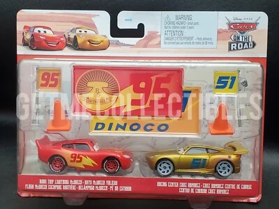 DISNEY PIXAR CARS ROAD TRIP MCQUEEN RACING CENTER CRUZ 2022 2 PACK SAVE 6% GMC - Image 1 of 2