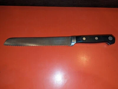Cuchillo para pan Farberware Pro forjado de acero inoxidable de 8" hoja dentada remache grande Foto 1 de 4
