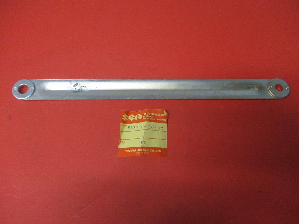 NUEVO DE LOTE ORIGINAL OEM SUZUKI TS90 TS100 TC120 ENLACE DE PAR TRASERO 64310-20100 Foto 1 de 1