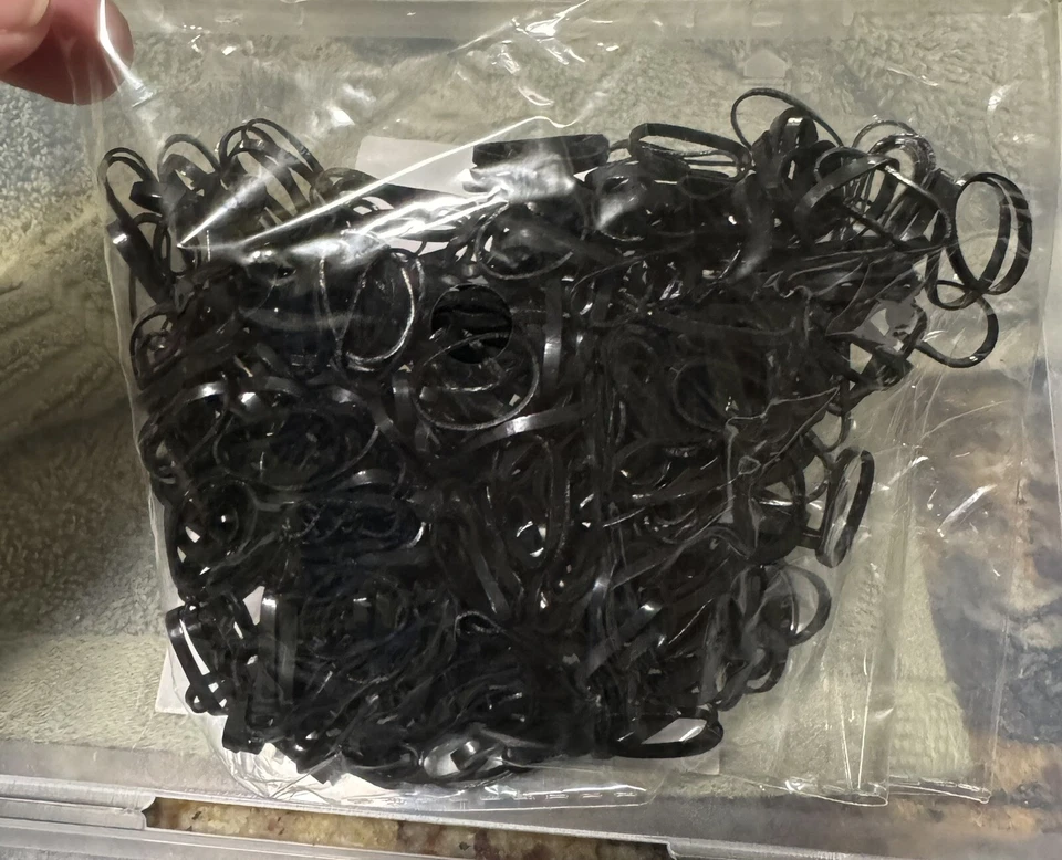 500 rubber band hair ties and styling tools - Image 1 of 4