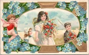 Postal vintage de San Valentín holandesa niño y niña Cupido niña flores c1912 - Imagen 1 de 2