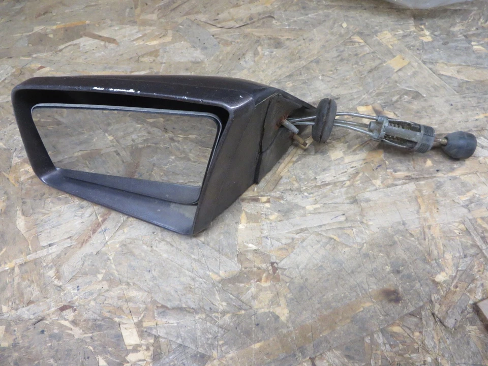 FORD MUSTANG 79-84 MERCURY CAPRI 79-84 ESPEJO RETROVISOR IZQUIERDO MANUAL OEM Foto 1 de 4