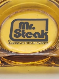 Mr Steak Ashtray Vintage. Amber glass. About 3 1/2 inches square. - Picture 1 of 3