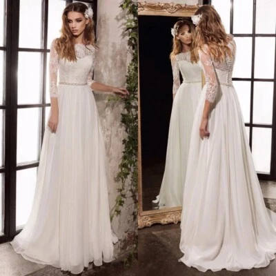 Elegant A-Line Wedding Dresses Round Neck 3/4 Sleeved Lace Applique Bridal Gowns - Image 1 of 4