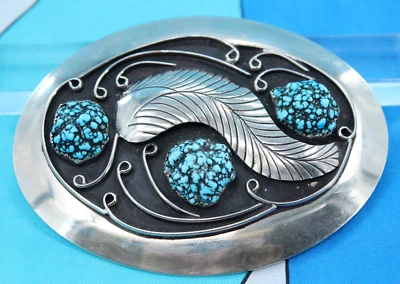 Hebilla de cinturón de colección con patrón de hojas de metal y piedras turquesa tono plata Foto 1 de 4