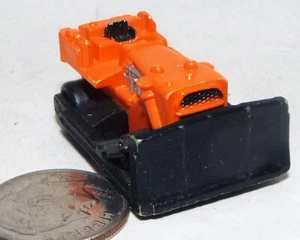 Small Micro Machine Bulldozer Construction Vehicle in Orange & Black No Cab Roof - Picture 1 of 3