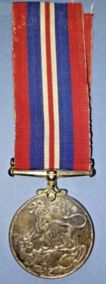 The 1939-45 War Medal  WW2 - Canadian Silver Issue - Near Extremely Fine, Toned - Image 1 of 4