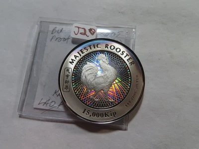 J20 Lao PDR 2005 Silver 15k Kip 0.6424Oz ASW Year of the Rooster Hologram PROOF - Image 1 of 2