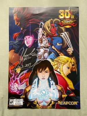 E3 2017 Street Fighter 30th Anniversary poster autograph signed by Yoshinori Ono - Image 1 of 2