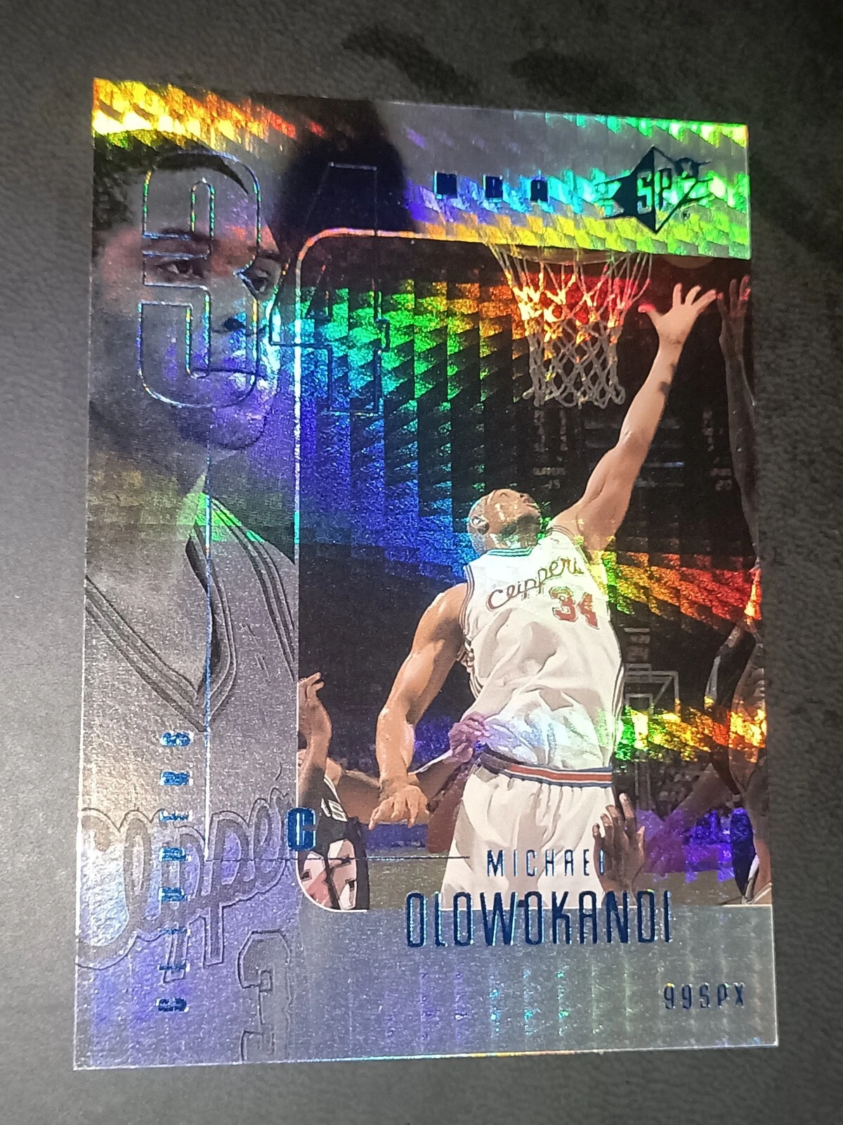 MICHAEL OLOWOKANDI 1999 SPX RADIANCE #/100