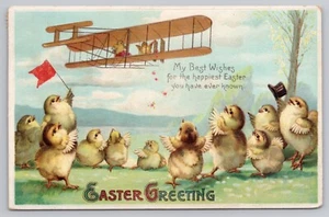 Auguri di Pasqua 1911 - Pulcini antropomorfi in aereo - Cartolina cappello a cilindro - Foto 1 di 7