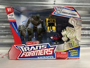 Target Ex. Transformers Animazione Stealth Lockdown Optimus Prime Bumblebee NUOVO - Foto 1 di 11