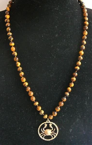 Tiger’s eye knotted bead necklace with 14 Karat gold Cancer pendant - Picture 1 of 2