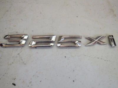 BMW 325Xi 325 XI 2004 2,5 L sedán emblemas insignia logotipo Foto 1 de 4