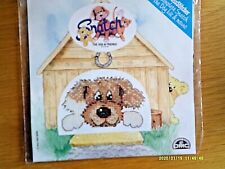 Snatch the dog in his kennel. With Teddy. Cross stitch kit with mount.