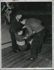 1935 Press Photo Freddie Spencer helped up after a fall at track meet