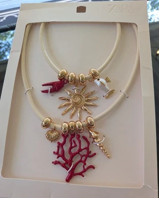 ZARA Collares Mujer 2025 Pack De 2 Dijes Marinos Rojo Crema Dorado Costero NUEVO Foto 1 de 4