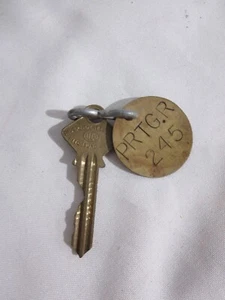 Vintage Brass Key Independent Lock Co w/ Brass Tag reads PRTG.R 245 - Picture 1 of 4