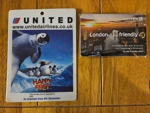 United Airlines Luggage Tags - (2) London fiendly 1 year of service & Happy Feet - Picture 1 of 4